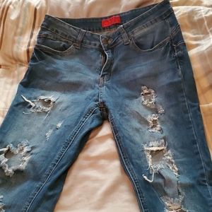 Distressed Blue Jeans